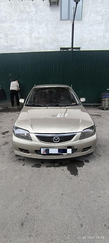 Mazda 323: 2003 г., 1.6 л, Автомат, Бензин, Хэтчбэк