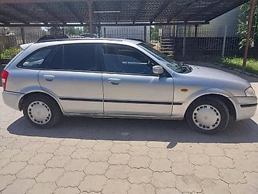 dodje ram: Mazda Familia: 1999 г., 1.6 л, Механика, Бензин, Универсал — 3