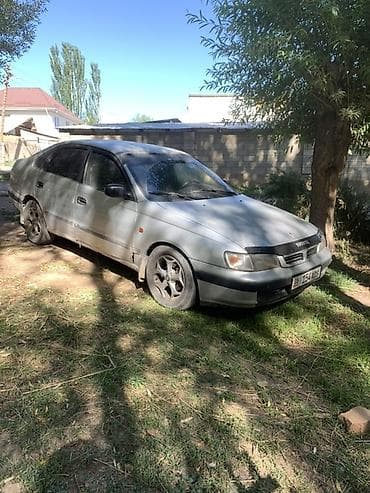 маленький машинка: Toyota Carina E: 1997 г., 1.8 л, Автомат, Бензин, Хэтчбэк — 5