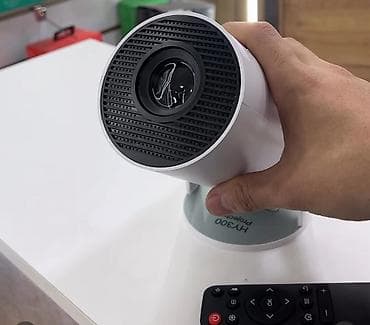 аренда проекторы: Портативный домашний проектор HY300 - Компактный цилиндрический — 1