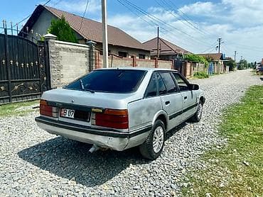 выкуп авто рф: Mazda 626: 1985 г., 2 л, Механика, Бензин, Лифтбек — 4