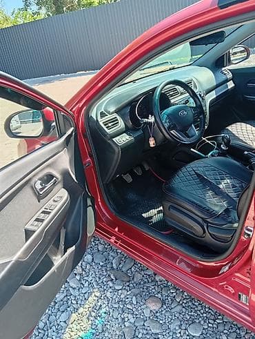 кызыл кия кыз: Kia Rio: 2012 г., 1.6 л, Кол менен иштөөчү, Бензин, Седан — 6