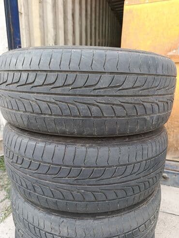 новые шыны: R-18 -215-45. Привозные из Японии. Шины летние комплект 4 шт. По нашим — 3