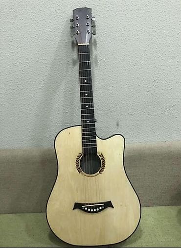 Музыкалык аспаптар: Акустическая гитара с вырезом (cutaway) формата дредноут. Основные — 1