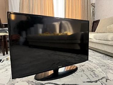 led: Телевизор Samsung, диагональ около 32–37". Плоская панель, тонкая — 2