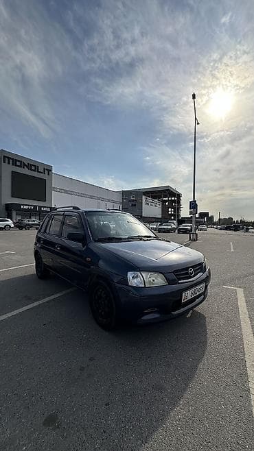 Продажа авто: Mazda Demio: 2000 г., 1.3 л, Механика, Бензин, Хэтчбэк — 9