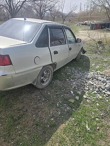 по запчастям: Daewoo Nexia (седан), серебристый цвет. Автомобиль после серьезного — 2