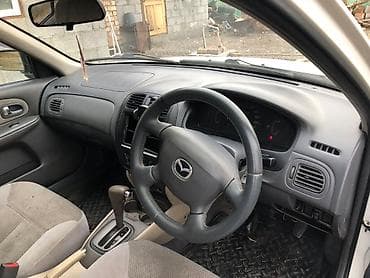 daf 75: Mazda 323: 1999 г., 1.9 л, Автомат, Дизель, Седан — 3