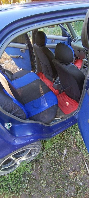 Nissan March: 1996 г., 1 л, Вариатор, Бензин, Кроссовер — 10