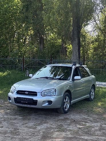 что за машина: Subaru Impreza: 2004 г., 1.5 л, Автомат, Газ, Седан — 9