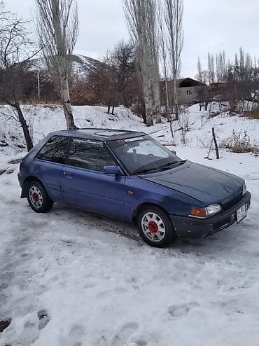 lada xray: Mazda 323: 1994 г., Хэтчбэк — 2