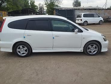 q 7: Honda Stream: 2003 г., 2 л, Автомат, Бензин, Универсал — 4