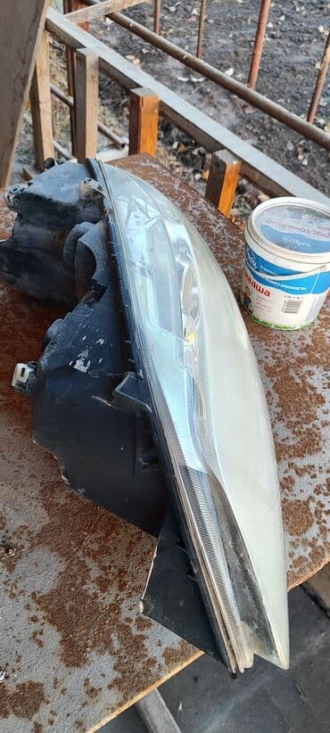 Передняя левая фара Mazda 2004 г., Б/у, Оригинал