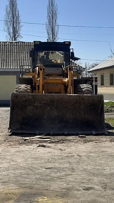 kia cerato: Погрузчик, Колесный, Фронтальный — 1