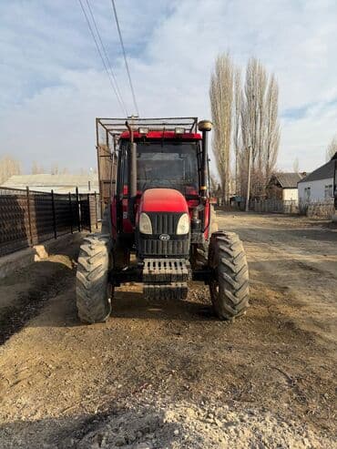 продается электро мото и скутер мотоцикл: Трактор колёсный, красный, с закрытой остеклённой кабиной. Основные — 4