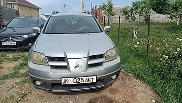 прикуриватель outback: Mitsubishi Outlander: 2004 г., 2 л, Механика, Бензин, Кроссовер — 2