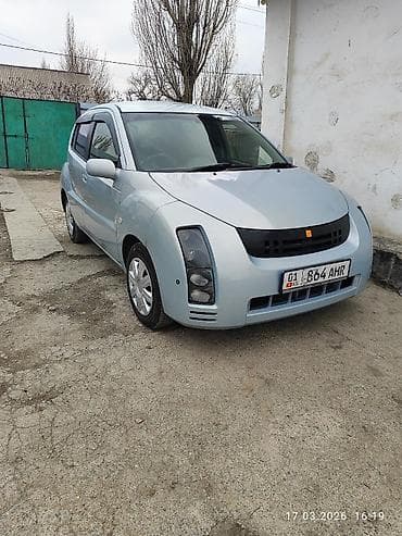 mitsubishi спейс стар: Компактный 5‑дверный хэтчбек, правый руль. Серебристо‑голубой цвет — 1