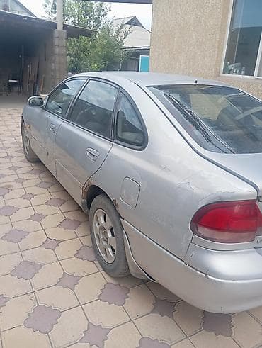 Mazda Cronos: 1993 г., 2 л, Механика, Бензин, Хэтчбэк
