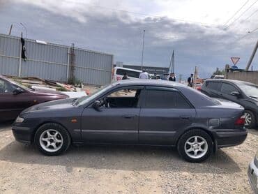 авто мини: Mazda 626: 1997 г., 1.8 л, Механика, Бензин, Седан — 4