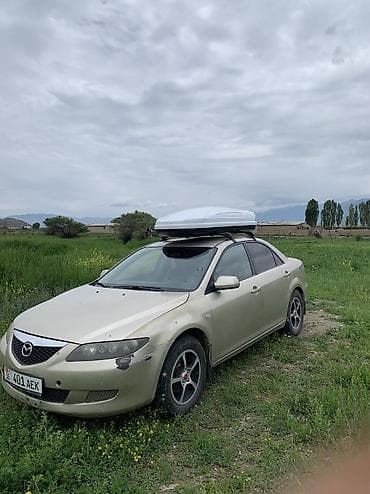 эшке: Mazda 6: 2004 г., 2 л, Кол менен иштөөчү, Бензин, Седан — 9