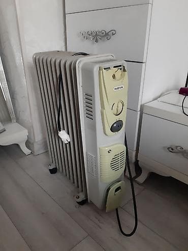 инфракрасные обогреватели с терморегулятором: Масляный обогреватель Кол-во секций: 10 и более, Встроенный вентилятор — 3