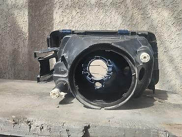 Передние фары: Передняя левая фара Audi — 5