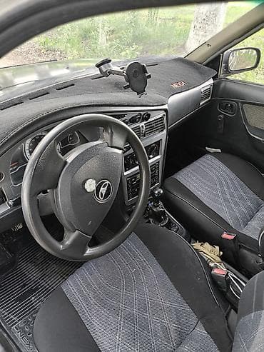 aydi c4: Daewoo Nexia: 2009 г., 1.5 л, Механика, Бензин, Седан — 8