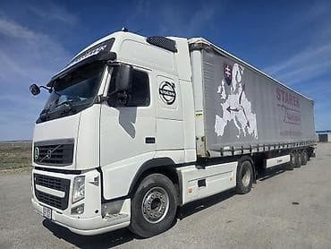 100 с4: Тягач, Volvo, Тентованный — 1