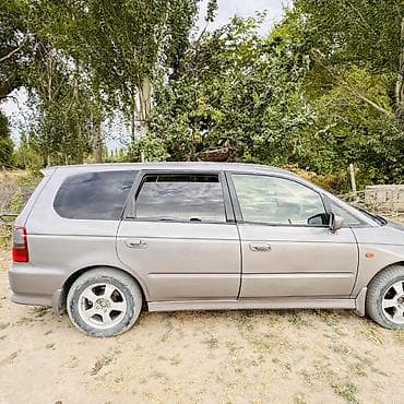 двойной выхлоп: Honda Odyssey: 2001 г., 2.3 л, Автомат, Газ, Минивэн — 3