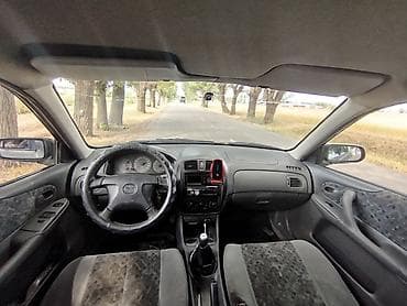 step wgn: Mazda 323: 1999 г., 1.6 л, Механика, Бензин, Универсал — 6