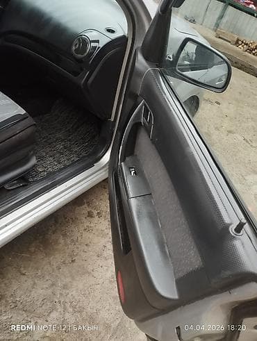 трансмистер: Chevrolet Aveo — интерьер и оснащение - Салон: передняя панель с — 1