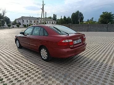 down pipe: Mazda 626: 2000 г., 2 л, Механика, Бензин, Хэтчбэк — 2