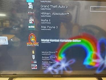 redmi pad 2: Sony PlayStation 3 Slim (модель с логотипом PS3 на крышке). На консоли — 3