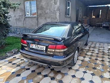 авто газ 66: Mazda 626: 1997 г., 1.8 л, Ручные, Бензин, Седан — 4