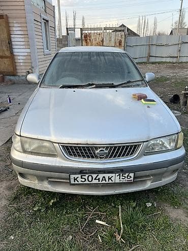 Nissan Sunny: 1990 г., Механика, Бензин, Седан