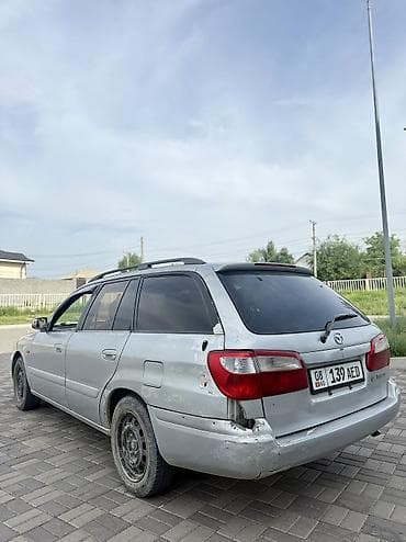 мазда фамиля: Mazda 626: 2002 г., 1.8 л, Автомат, Бензин, Универсал — 5
