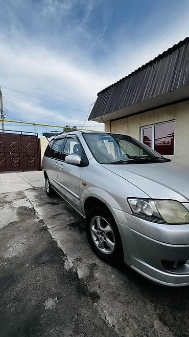 Транспорт: Mazda : 2003 г., Кол менен иштөөчү, Бензин — 5