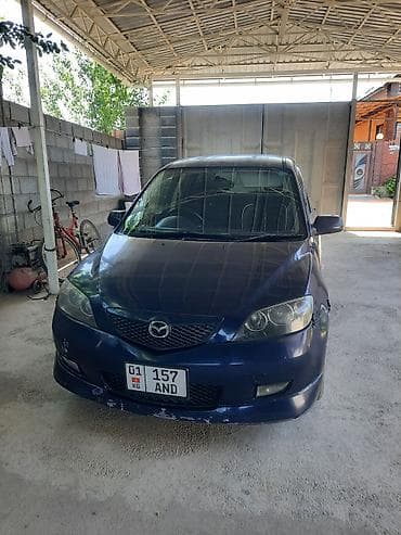 2 8: Mazda Demio: 2003 г., 1.5 л, Автомат, Бензин — 2