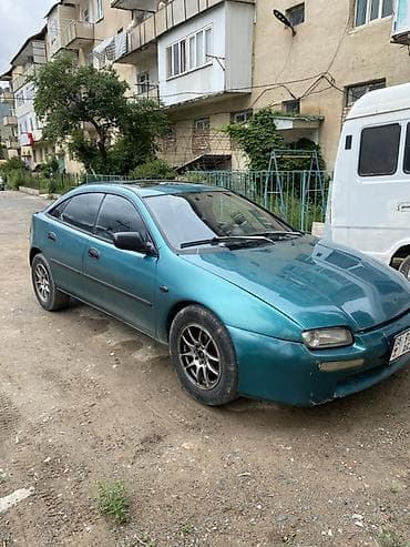 Mazda Lantis: 1994 г., 1.6 л, Механика, Бензин, Седан