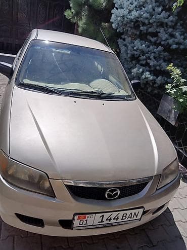 step rf3: Mazda Protege: 2001 г., Автомат, Седан — 1