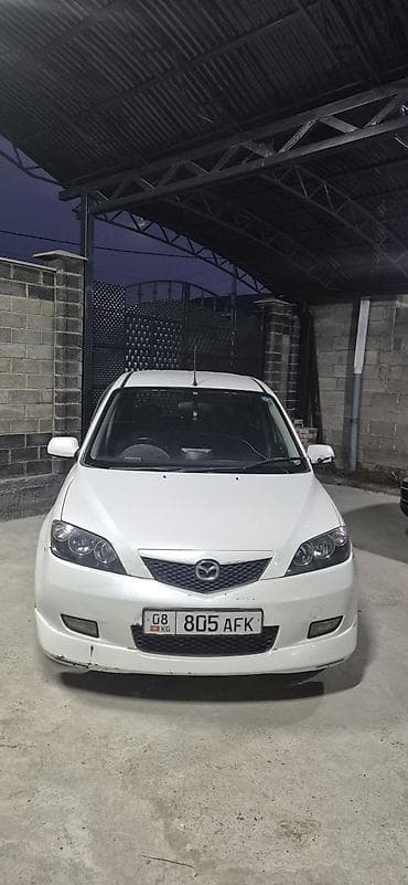 Mazda Demio: 2004 г., 1.5 л, Автомат, Бензин, Хэтчбэк