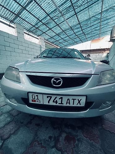 конда: Mazda 323: 2000 г., 1.6 л, Автомат, Бензин, Хэтчбэк — 8