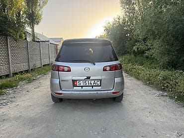 мазда катела: Mazda 2: 2006 г., 1.4 л, Механика, Газ, Хэтчбэк — 7