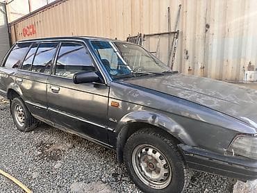 124 amg: Mazda 323: 1988 г., 1.5 л, Универсал — 4