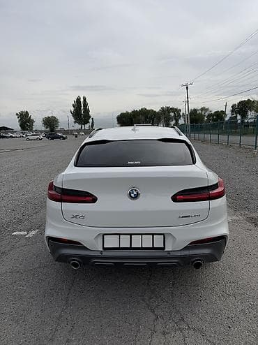 x 7: BMW X4 — интерьер и оснащение - Спортивный кожаный руль M с — 6