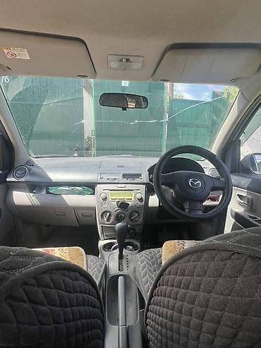 авто чихол: Mazda Demio: 2004 г., Автомат, Бензин, Хэтчбэк — 1