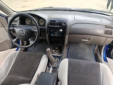 маш: Mazda 626: 2000 г., 1.8 л, Механика, Бензин, Универсал — 8