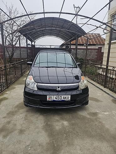 митсубиси паджеро 1: Honda Stream: 2004 г., Автомат, Минивэн — 1