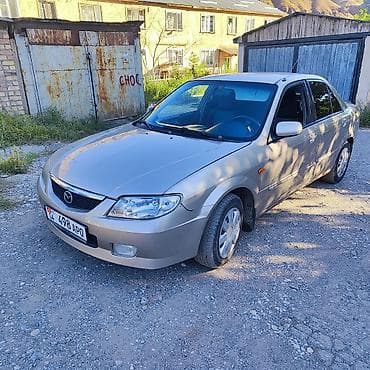 бутка бу: Mazda Familia: 2002 г., 1.6 л, Автомат, Бензин, Седан — 4