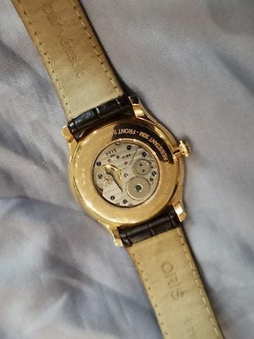 часы whoop: Oris 396-7580-60-51LS — швейцарские механические золотые наручные — 2